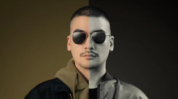 military man in aviator sunglasses with black lenses