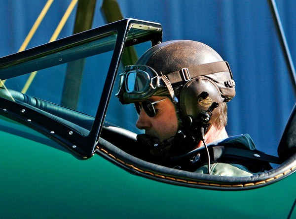 Dave Unwin flying while wearing Randolph Aviators under pilot helmet. 