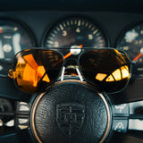 Aviator DriveWorks with red orange reflective lenses and black frames