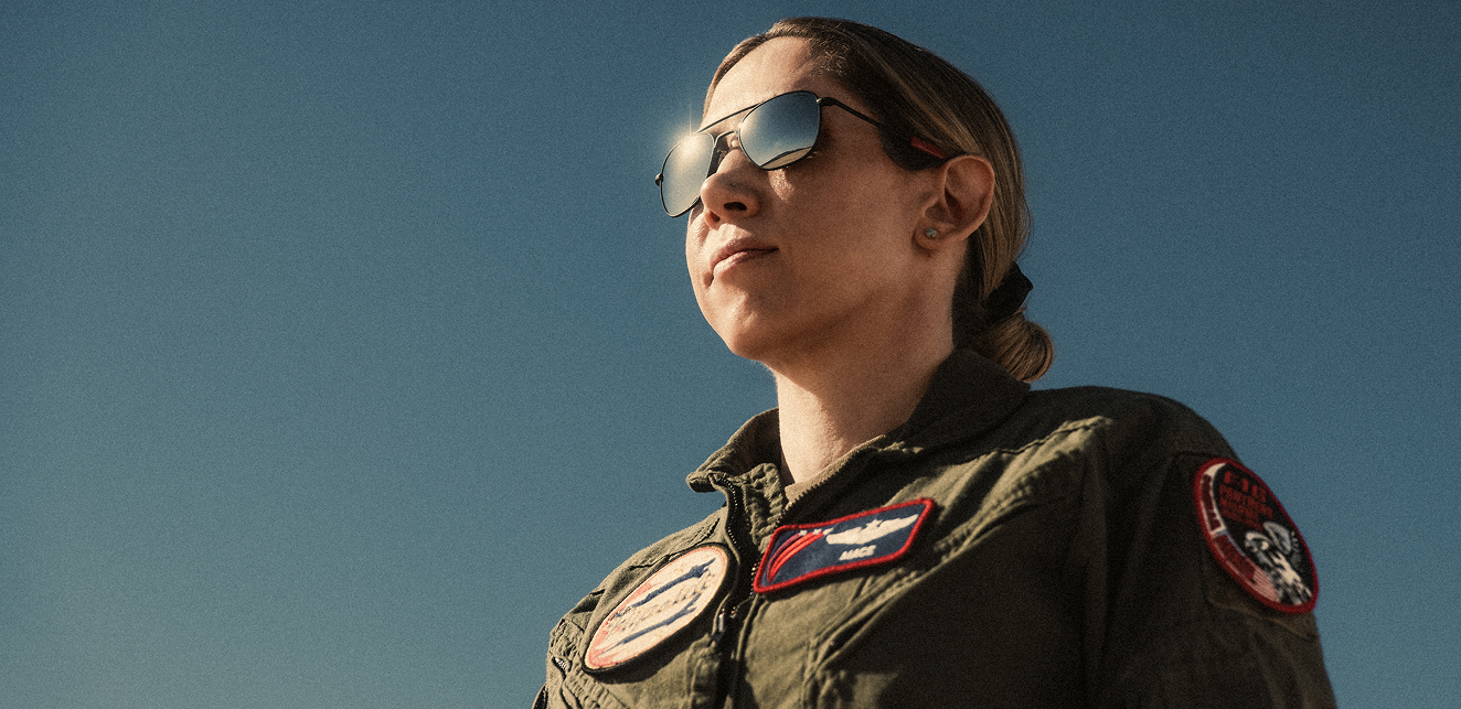 U.S. Air Force Thunderbirds pilot Mace Curran wearing Randolph Aviator sunglasses with reflective silver lenses.