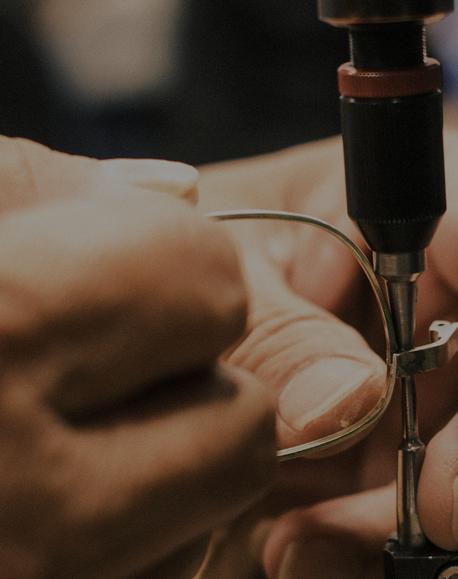 Close-up of a Randolph Aviator frame being assembled by hand.