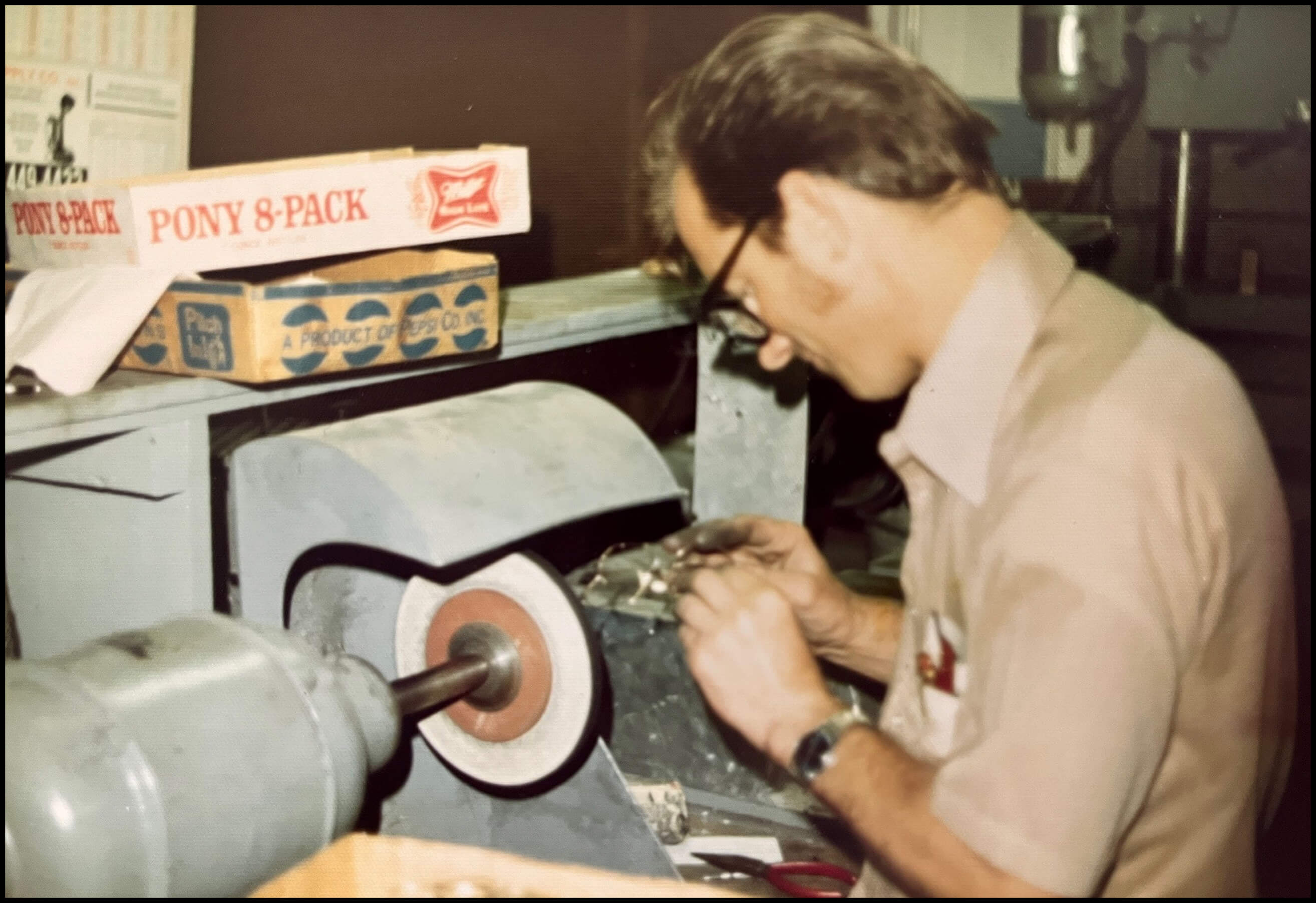 A vintage photograph of Randolph sunglasses being handcrafted in the factory.